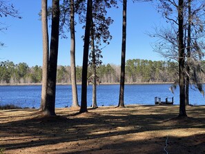 Lake out in front of the home with dock