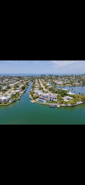 Drone view of the canal.  Minutes from the beach and tampabay! Bring your boat!!