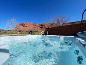 After a day of epic adventures, soak your tired muscles in the hot tub with the most amazing views!