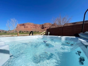 After a day of epic adventures, soak your tired muscles in the hot tub with the most amazing views!