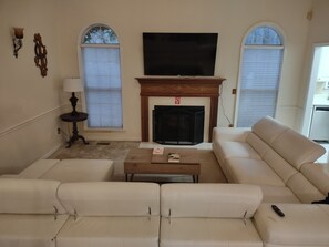 living room with 65 inch smart tv