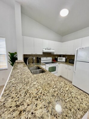 Kitchen with granite counters