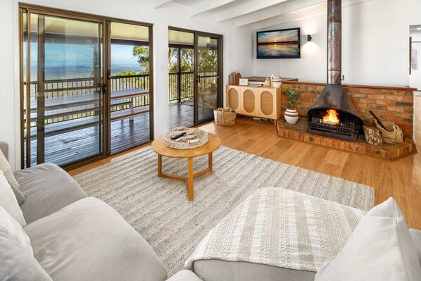 Lounge back and warm up by the fire place