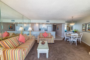 Combfy Queen sized sleeper sofa and matching love seat. Beautiful coastal accents!