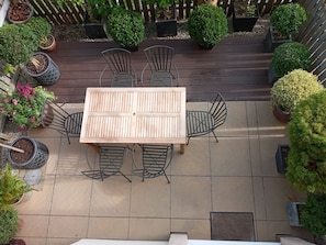 The lovely patio, with a view over the race course and dining table to seat 6