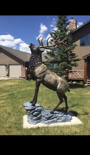 Aluminum Elk statue outside the front door 
