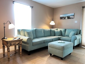 Living area has lots of seating for your group.