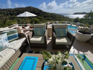 Amazing views towards Montserrat from the covered seating area and pool