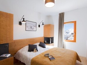 Get a peaceful night sleep in our cozy bedroom.