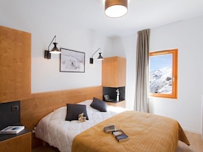 Get a peaceful night sleep in our cozy bedroom.