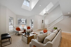 Lots of Outdoor Lighting Filter through the Windows to keep the Open Spaces feeling Fresh, Connected to the Outdoors and Light