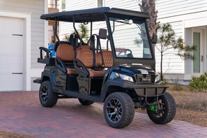 6 Seater Golf Cart Included with Your Rental!