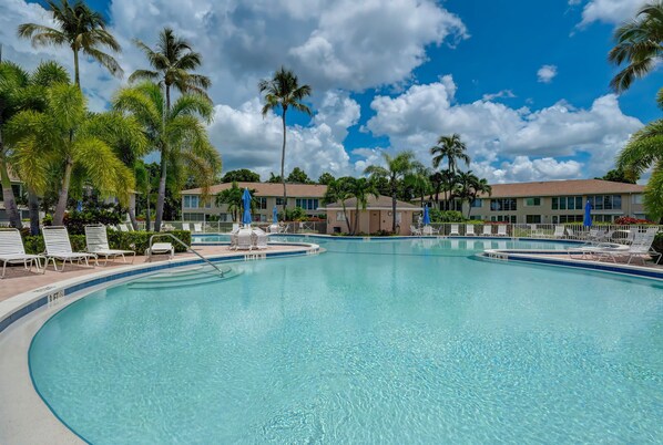 The Free Form Community Pool In the Courtyard of the Community