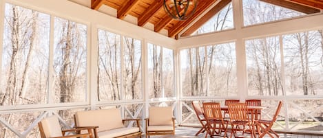 The fully screened-in porch is the most popular room in the house.