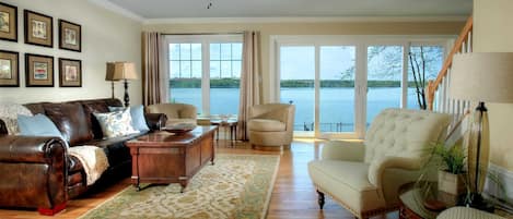 Living room with beautiful views of Owasco Lake