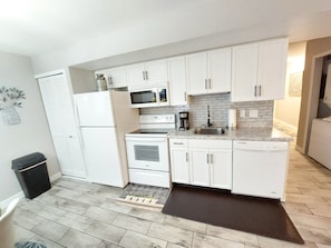 Full-sized Kitchen with all the appliances, utensils, and dishware of home!