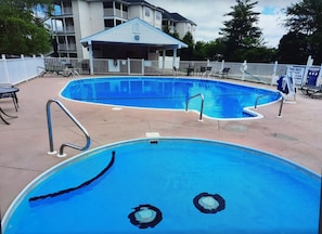 Large Outdoor Pool, Kids Pool, ample seating & covered patio!