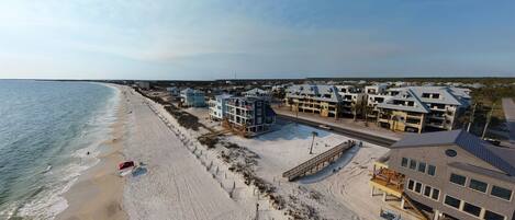 That’s you in the building across from the boardwalk - so close to the gorgeous white sands