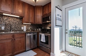 Kitchen next to the small balcony