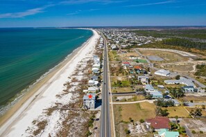 Aerial View of beautiful St. Joe Beach with the red star indicating the location of the property.