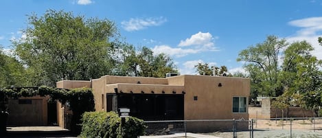 Front of the home with it's own privacy, street parking, and tandem parking spot