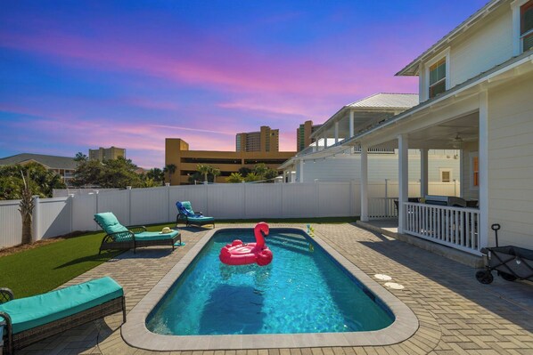 Welcome to " Footprint in the Sand" Beach House: this 4 bedroom, 3.5 bath house on the west end of Panama City Beach offers a 5 min walk to the beach, private pool and game room. The perfect place for your next vacation.