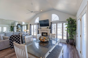 Open and Bright living area w/ 65" TV