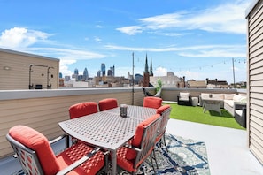 Tons of seating on this one of kind roof deck!