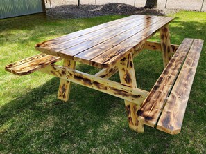 Beautiful 8 foot long and extra wide, picnic table added May of 2024! 