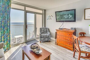 Living Room | Amenity Wristbands Provided | Elevator Access | Coin Laundry