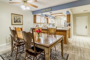 Kitchen overlooks the dining and living areas.