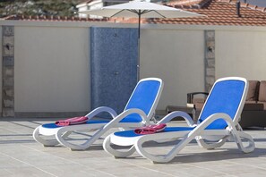 ‘Chill out’ on our comfortable sun loungers