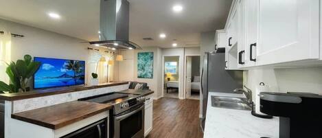 Modern Home; Spacious open kitchen with stainless steel appliances