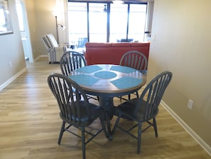 Dining table that includes  expansion leaf