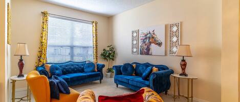 Formal Sitting Area As You Enter The Home - Colorful and Comfortable!