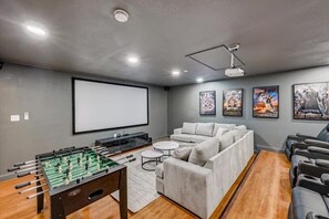 Taking entertainment up a notch with a cinema room and foosball!