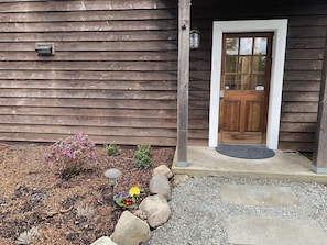 Back entry where guests will initially access the home