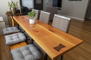 Dining table, chairs doubles as a great work area.