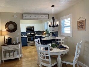 Dining area and coffee bar. Leaf and 2 additional chairs available