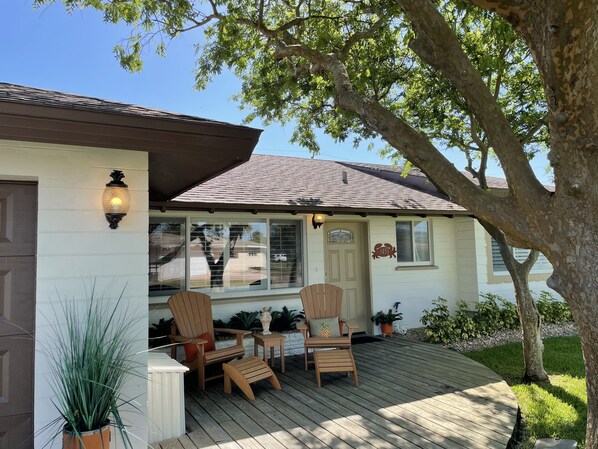 Cozy front porch with the best sunset views! 