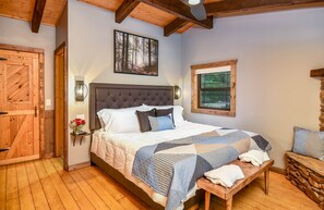 Enjoy a comfortable King-size bed next to a cozy fireplace w/private bathroom.