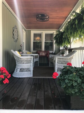 Cozy front porch with sunset views