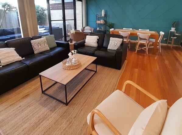 Sit back and relax in the open living/dining area overlooking the alfresco area