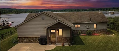 Sunset view of house on the lake