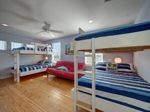 Bunk room with futon