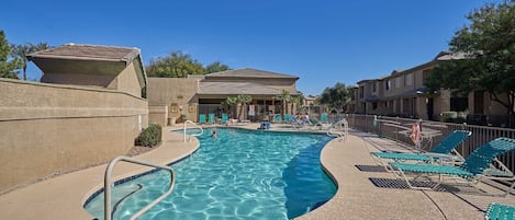 Huge heated saltwater pool and hot tub w/BBQ/dining area. 