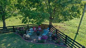 The firepit area... sometimes you will be joined by our cows right behind you.