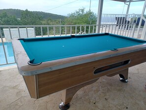 8' slate pool table for your enjoyment.