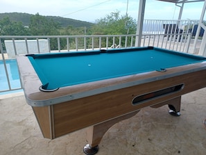 8' slate pool table for your enjoyment.