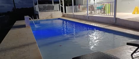 14' X 36'  Zero Entry Style Salt water SOLAR heated pool.